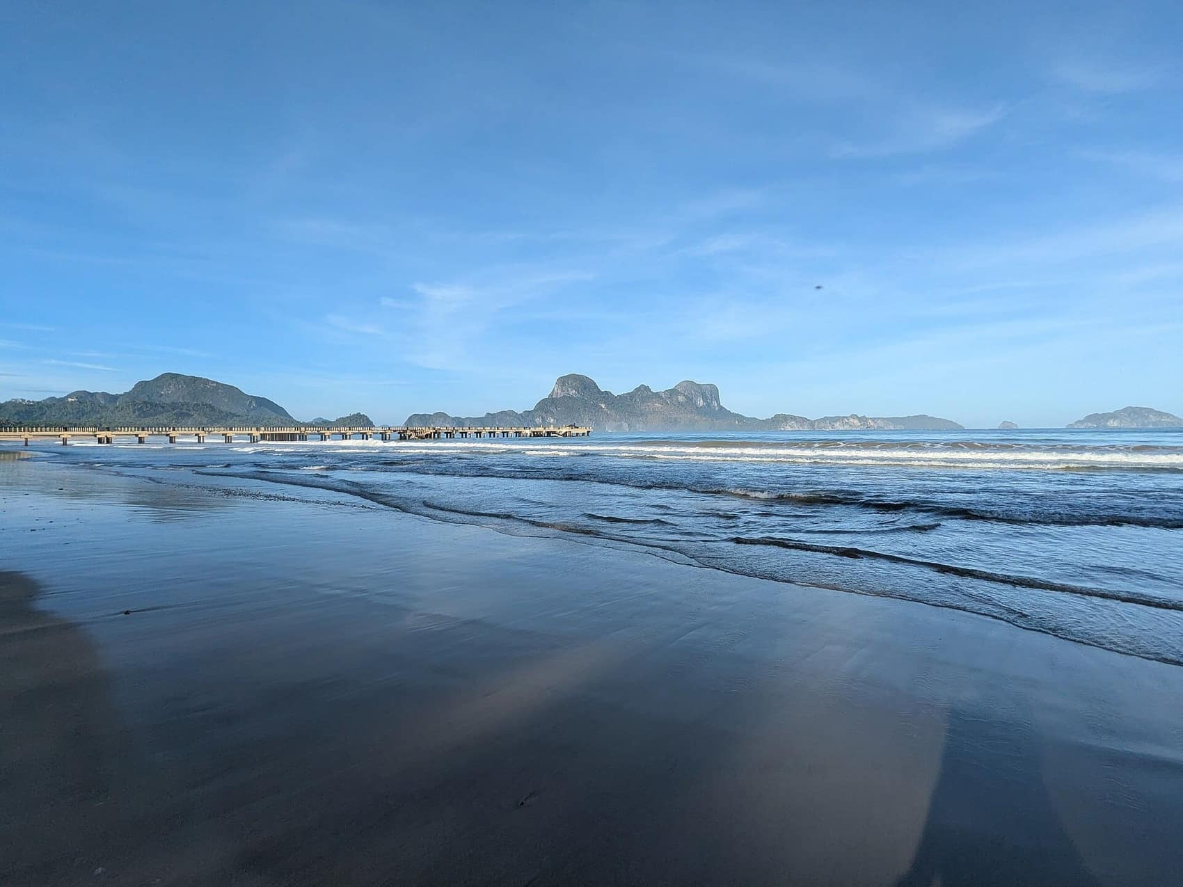 Lio Beach: a wide, easy stretch of sand near the airport with the karst islands on the horizon