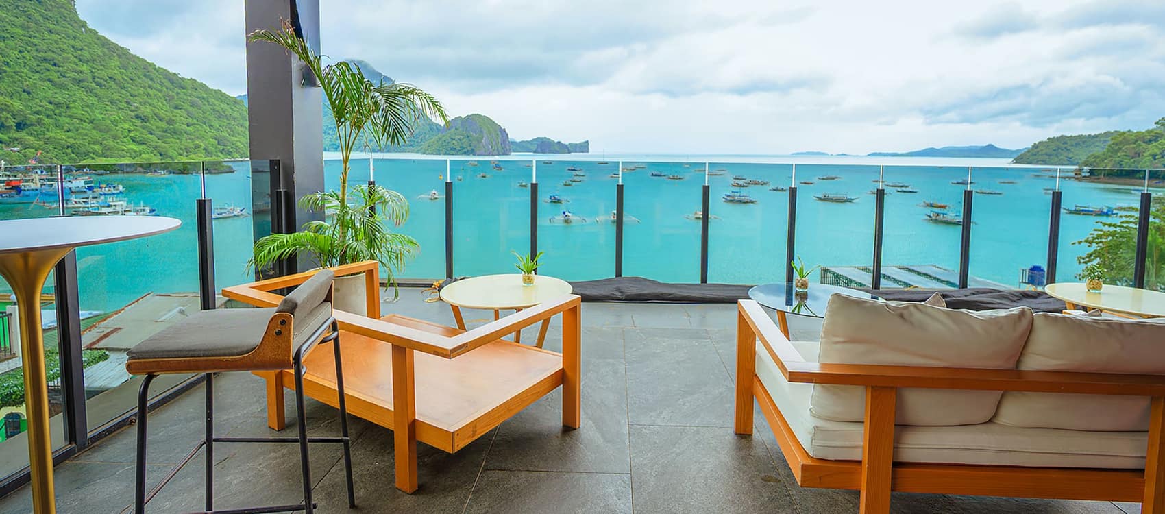 Piece of Sky, the rooftop bar, with the full sweep of Bacuit Bay in front of it