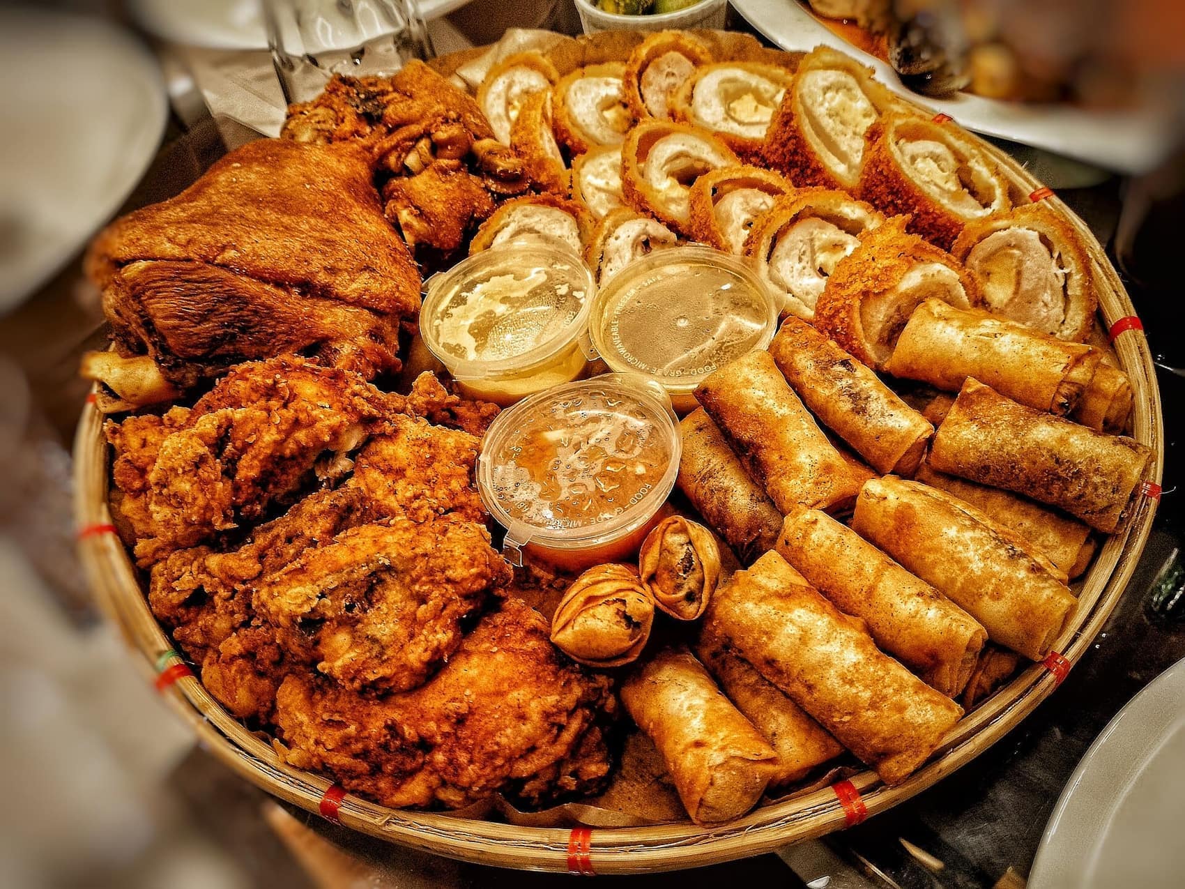 A bilao of fried chicken and lumpiang shanghai: how Filipino families order