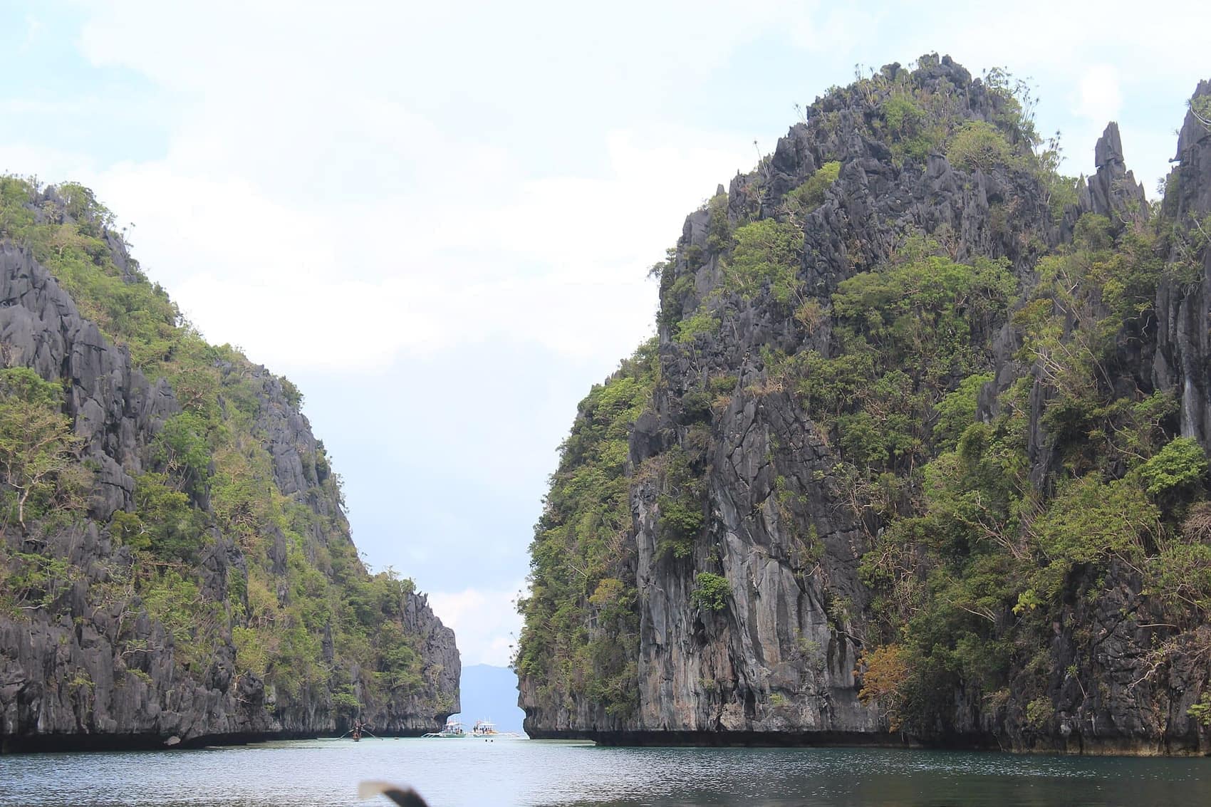 The Big Lagoon's cliff-walled entrance. Get here before 8.30am and it is silent