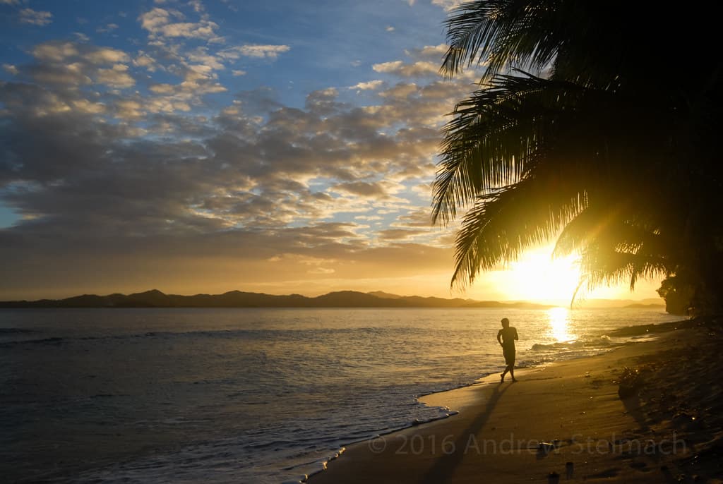 Low sun, empty beach, one silhouette. Siargao at the end of the day