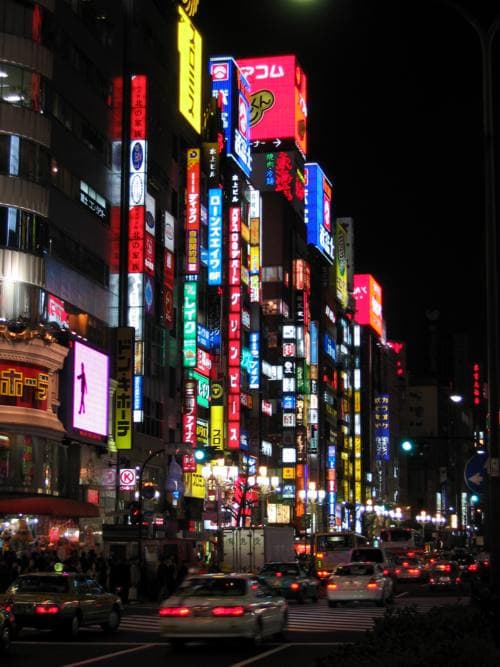 Shinjuku's neon comes alive right around the time you'll be arriving